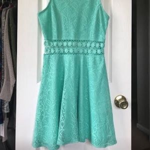 Dress with cut out lace detail around the waist